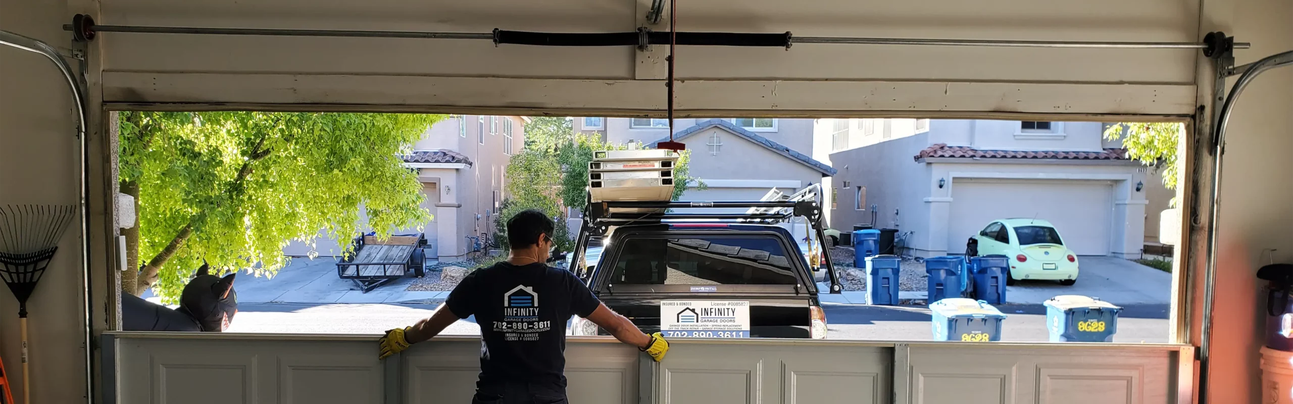 Infinity Garage Door technician performing a garage door repair Centennial Hills, Las Vegas.