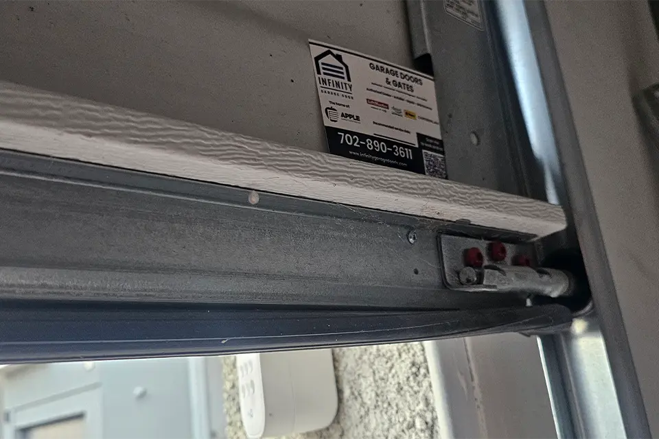 A garage door with weatherstripping and threshold seal